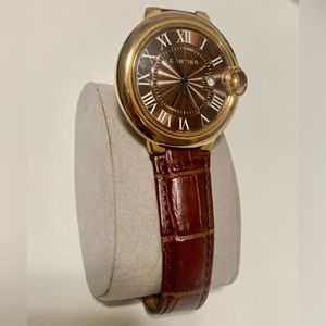 Very elegant brown and gold watch.